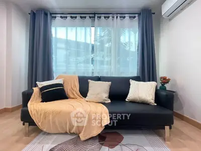 Cozy living room with modern sofa and stylish decor