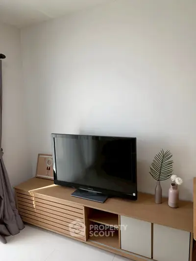 Modern living room with sleek TV stand and minimalist decor