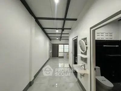 Spacious modern hallway with sleek design and natural light