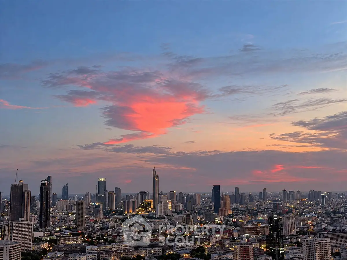 Stunning cityscape view at sunset showcasing vibrant skyline and urban architecture.