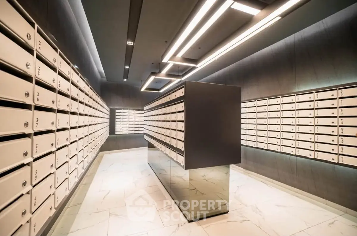 Modern apartment building mailroom with sleek design and ample mailboxes
