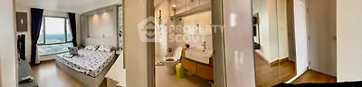 Modern apartment interior with bedroom, bathroom, and hallway showcasing sleek design and natural light.