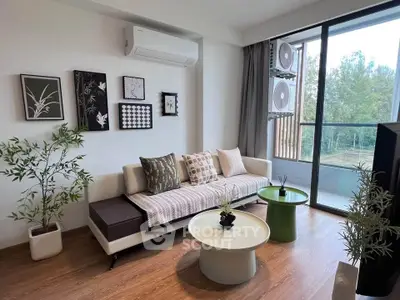 Stylish living room with modern decor and balcony view