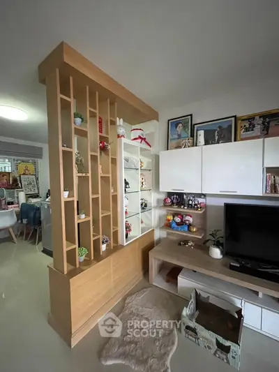 Stylish living room with modern shelving and decor