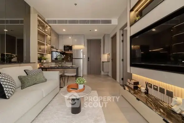 Modern living room with stylish decor and open kitchen layout