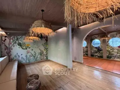 Charming interior with rustic decor and nature-themed wall art, perfect for a cozy living space.