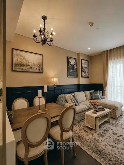 Charming living room with elegant decor, cozy seating, and stylish dining area in a modern apartment.