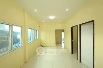 Spacious interior with large windows and bright lighting, ideal for customization.