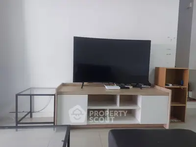 Modern living room with sleek TV stand and minimalist decor
