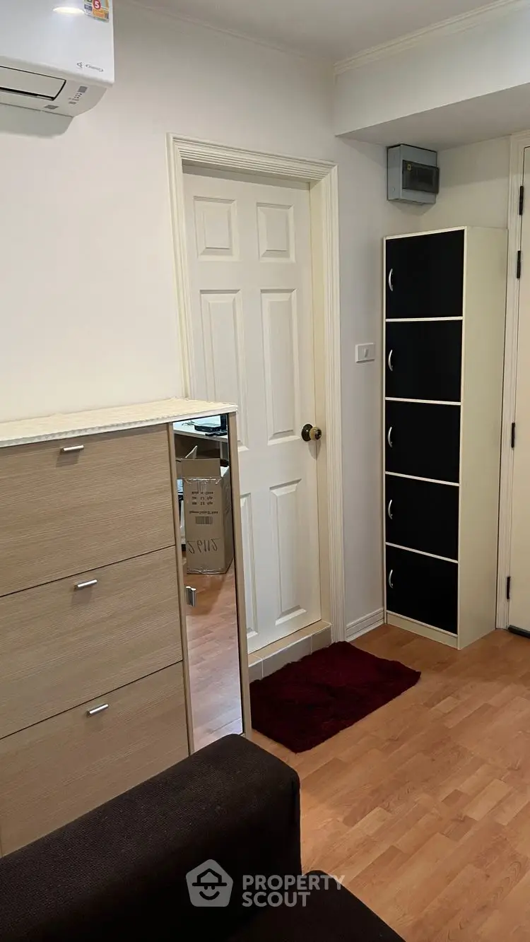 Cozy interior with wooden flooring and modern storage solutions