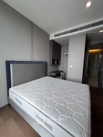 Modern bedroom with stylish headboard and sleek design