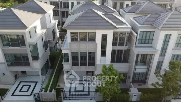 Luxurious modern villas with sleek design and spacious layout in a serene neighborhood.