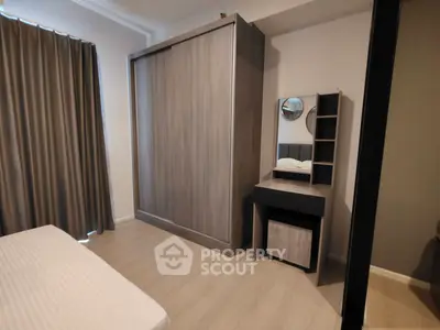 Modern bedroom with sleek wardrobe and stylish vanity set