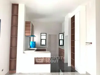 Modern kitchen with sleek cabinetry and open layout design