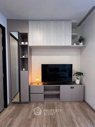 Modern living room with sleek TV unit and stylish decor