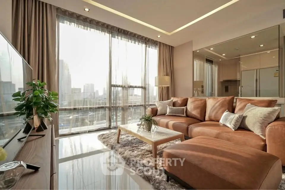 Luxurious living room with plush sofa and city view in modern apartment