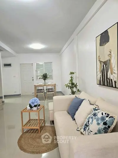 Modern living room with stylish decor and cozy seating area