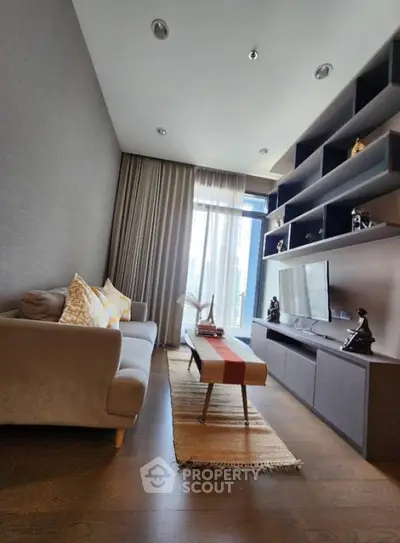 Modern living room with stylish shelving and cozy sofa in a high-rise apartment