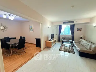 Spacious living room with elegant dining area and city view, perfect for modern urban living.