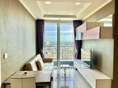 Modern living room with stunning city view and elegant decor