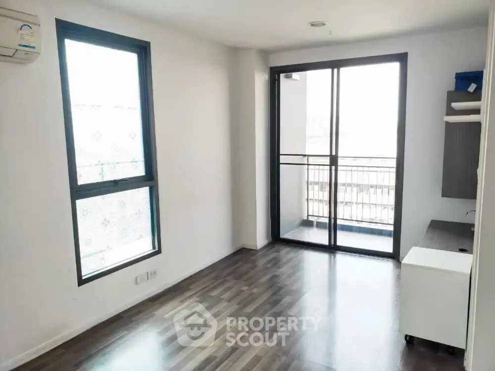 Bright modern apartment with balcony and hardwood floors