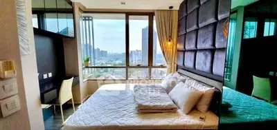Luxurious bedroom with stunning city view and modern decor