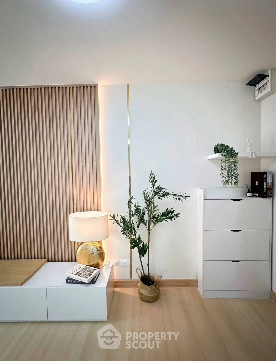 Modern minimalist living room with stylish decor and wooden accents