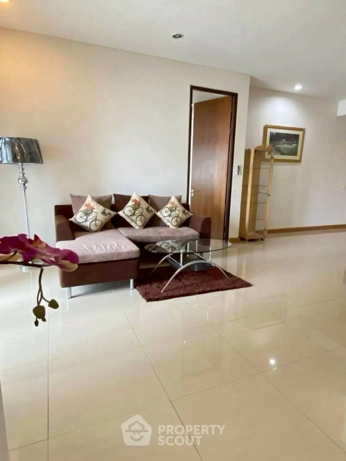 Spacious living room with modern decor and elegant furniture
