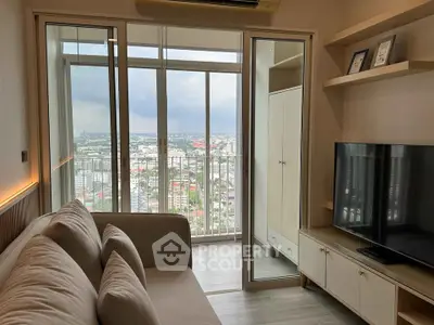 Modern living room with city view and sleek furniture