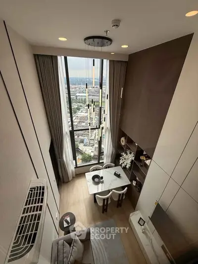 Luxurious high-rise living room with stunning city view and elegant decor