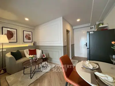 Stylish modern living room with elegant decor and cozy dining area, perfect for urban living.
