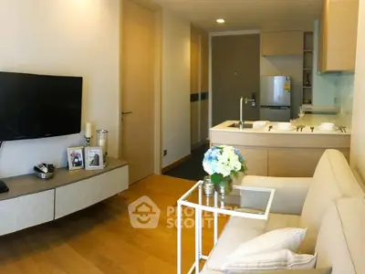 Modern living room with open kitchen and stylish decor