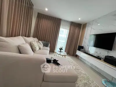 Modern living room with elegant decor and large sectional sofa