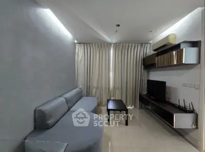 Modern living room with sleek furniture and stylish decor