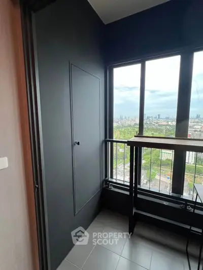Modern balcony with stunning city view, sleek design, and ample natural light, perfect for relaxation.