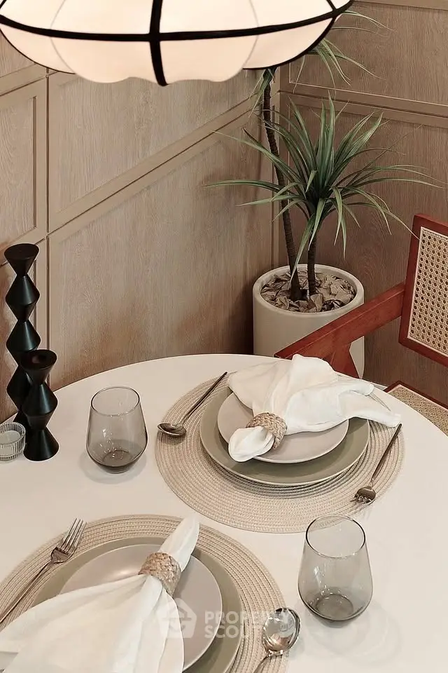 Elegant dining setup with modern decor and stylish tableware