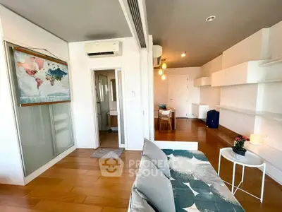 Modern living room with wooden flooring and stylish decor