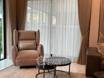 Luxurious living room with elegant armchair and modern coffee tables