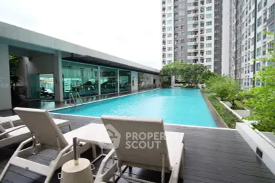 Luxurious condominium with stunning pool and modern amenities in prime location.