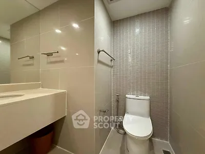 Modern bathroom with sleek design and neutral tones