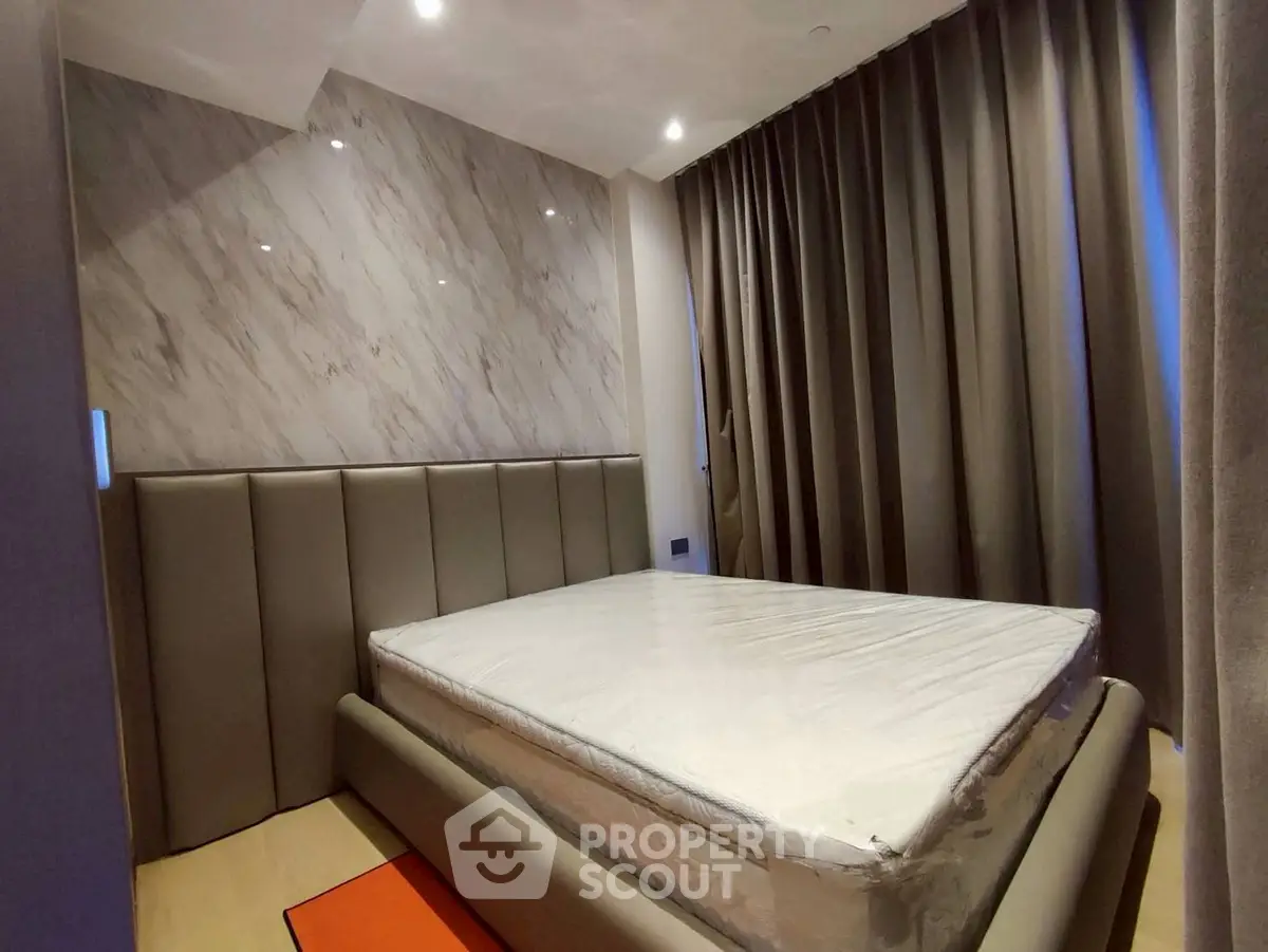 Modern bedroom with elegant design and luxurious finishes