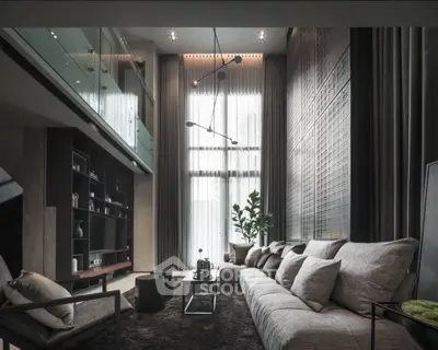 Luxurious modern living room with high ceilings and elegant decor