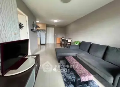 Spacious modern living room with sleek furniture and open layout