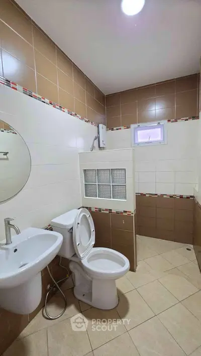 Modern bathroom with sleek fixtures and stylish tile design