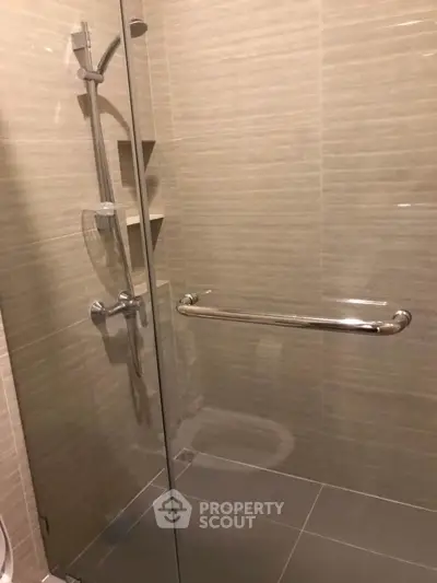 Modern bathroom with sleek shower design and glass door