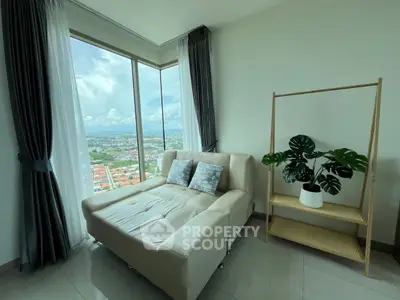 Modern living room with panoramic city view and stylish decor