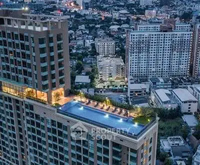 Stunning rooftop pool with cityscape view in modern high-rise building