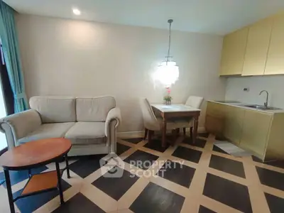 Chic modern living room with elegant furniture and stylish kitchen area