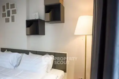 Cozy bedroom with modern decor and soft lighting