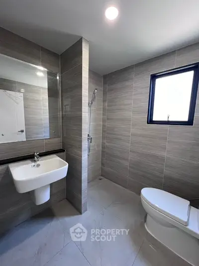 Modern bathroom with sleek design and natural light